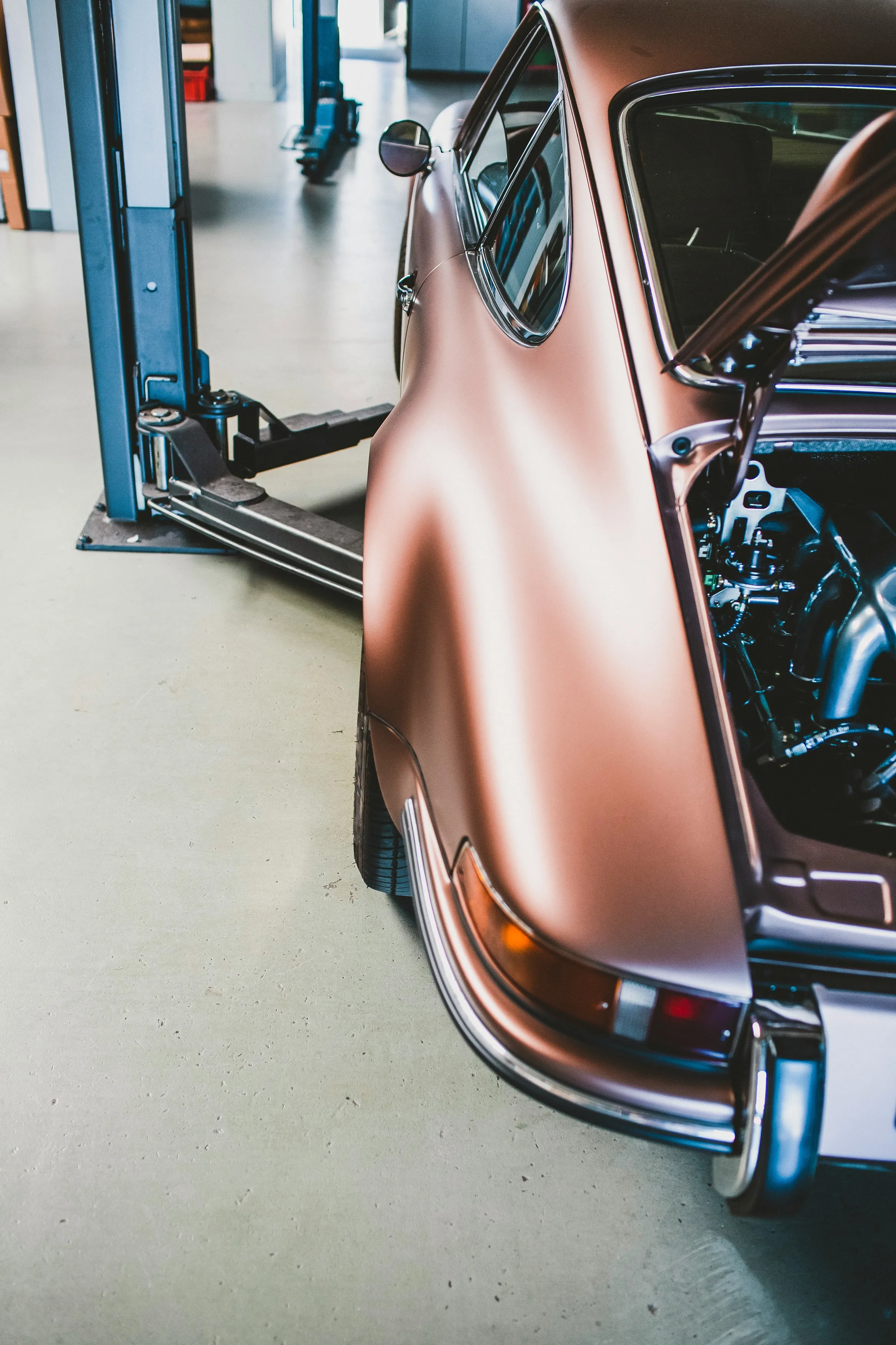 Classic car on the lift in our workshop